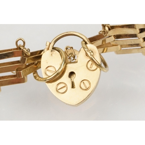 111 - Group of three 9ct gold bracelets to include a gate link bracelet with heart lock clasp (hallmarked ... 