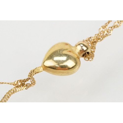 113 - Four 9ct gold pendant necklaces to include a locket pendant on a fine link chain (marked 375 to both... 