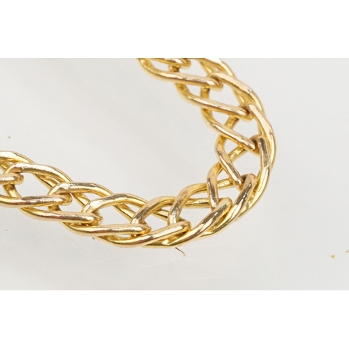 115 - Group of three bracelets to include a 9ct gold open bangle with heart shaped terminals (hallmarked S... 