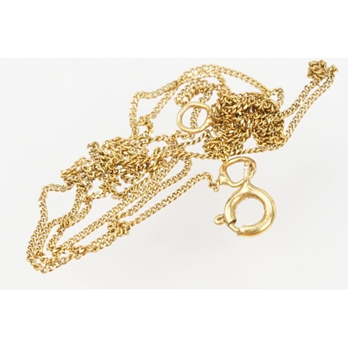 122 - Two 9ct gold necklaces to include a 9ct fine link chain with coral pendant, together with a fine lin... 