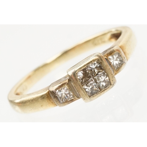 126 - 9ct gold and diamond ring. The ring being set with four princess cut diamonds to the head and two fu... 