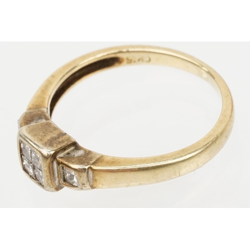 126 - 9ct gold and diamond ring. The ring being set with four princess cut diamonds to the head and two fu... 