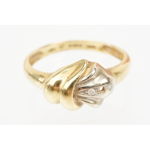 127 - Two gold diamond set rings to include a hallmarked 18ct gold knot design ring with diamond accent st... 