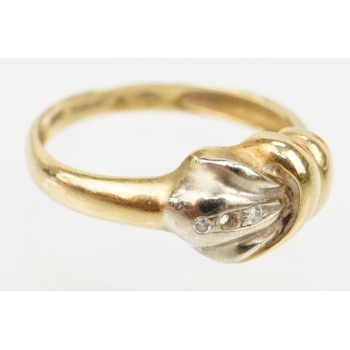 127 - Two gold diamond set rings to include a hallmarked 18ct gold knot design ring with diamond accent st... 