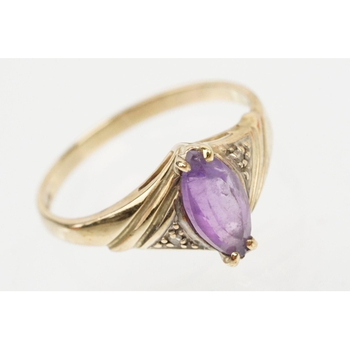 129 - Two 9ct gold hallmarked rings to include a marquise cut amethyst ring (hallmarked London 1991, size ... 