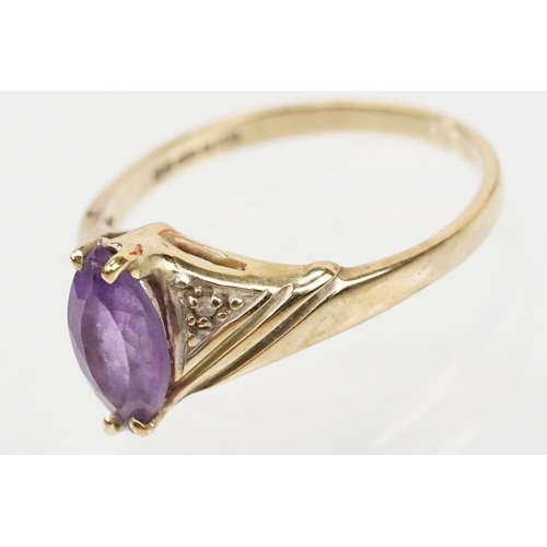 129 - Two 9ct gold hallmarked rings to include a marquise cut amethyst ring (hallmarked London 1991, size ... 