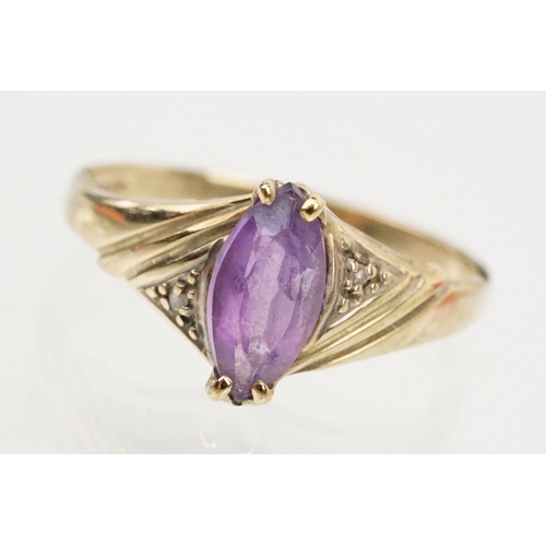 129 - Two 9ct gold hallmarked rings to include a marquise cut amethyst ring (hallmarked London 1991, size ... 