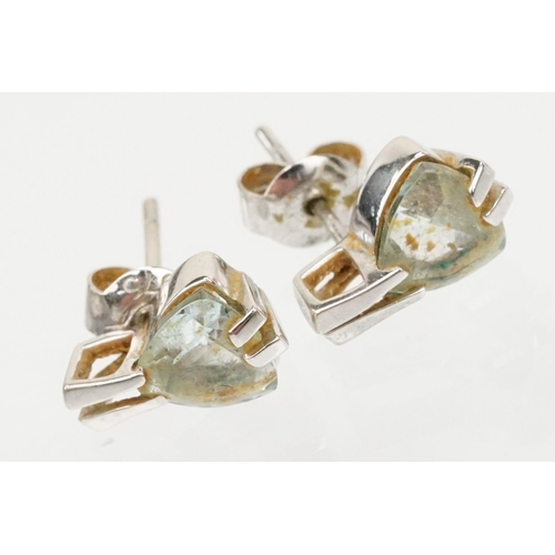 137 - Two pairs of 9ct gold earrings to include a pair of white gold and topaz earrings (marked 375) and a... 