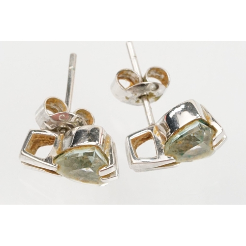 137 - Two pairs of 9ct gold earrings to include a pair of white gold and topaz earrings (marked 375) and a... 