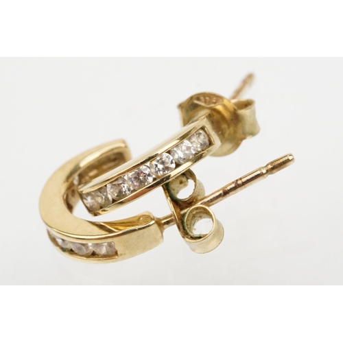 137 - Two pairs of 9ct gold earrings to include a pair of white gold and topaz earrings (marked 375) and a... 