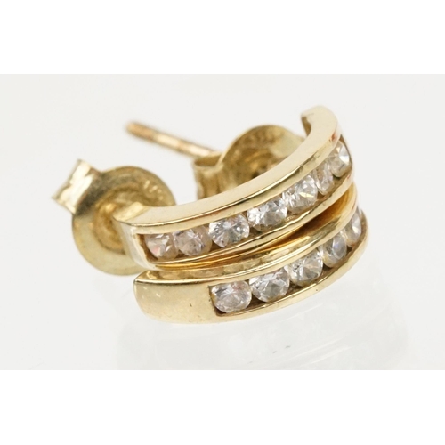 137 - Two pairs of 9ct gold earrings to include a pair of white gold and topaz earrings (marked 375) and a... 