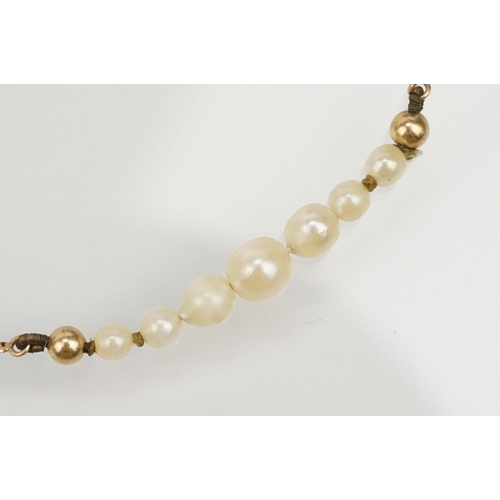 155 - 9ct gold and cultured pearl necklace with a fine gold chain threaded with cultured pearls (hallmarke... 