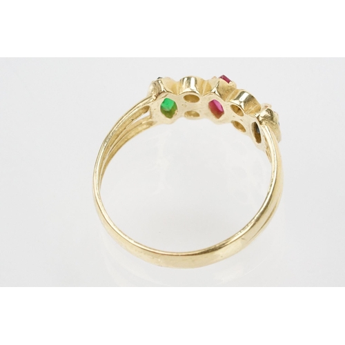 176 - 15ct gold gemstone set ring. The ring set with three marquise cut coloured stones to the head having... 