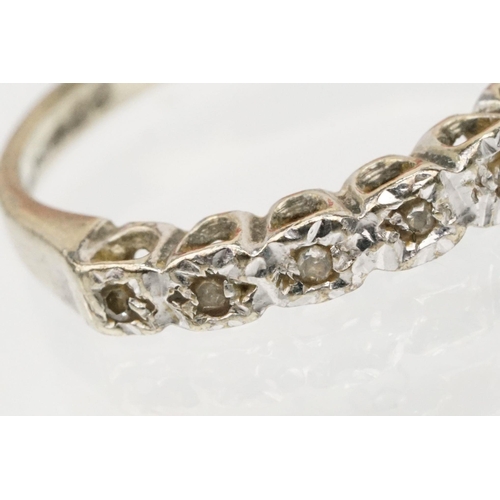 177 - Two 9ct gold rings to include a 9ct white gold and diamond half eternity ring (hallmarked Birmingham... 