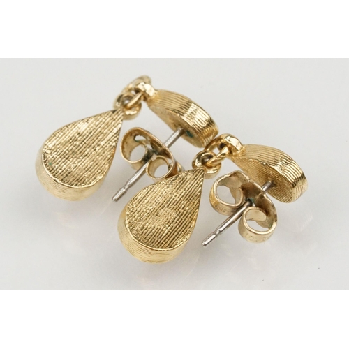 178 - Two pairs of 9ct gold Claddagh design hoop earrings with hinged posts. Both marked 375. Measures 2.5... 