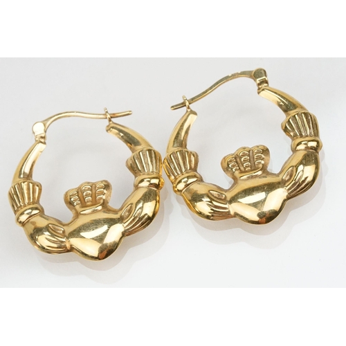 178 - Two pairs of 9ct gold Claddagh design hoop earrings with hinged posts. Both marked 375. Measures 2.5... 