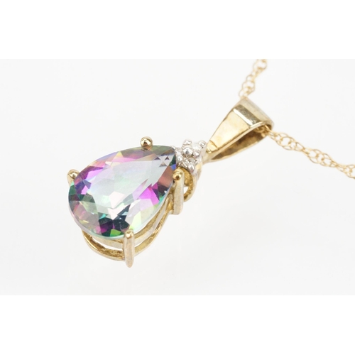 181 - Two 9ct gold pendant necklaces to include a mystic topaz set pendant on a fine link chain and a lyre... 