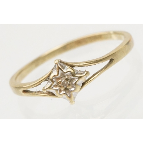 182 - 9ct gold and diamond ring having a round cut diamond star set to the head with pierced shoulders. Ha... 