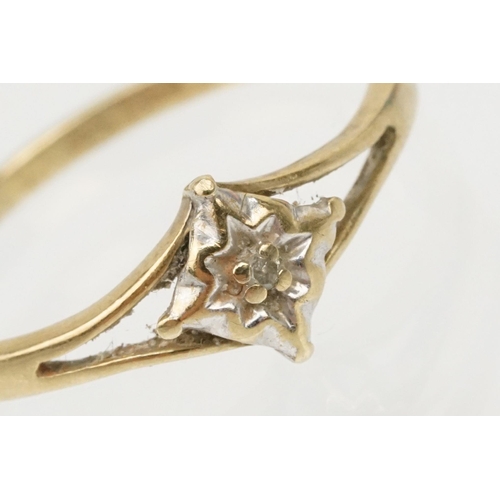 182 - 9ct gold and diamond ring having a round cut diamond star set to the head with pierced shoulders. Ha... 