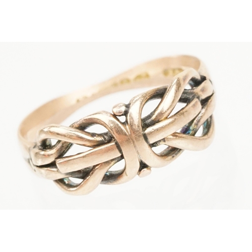 195 - 9ct gold knot design ring with pierced details (hallmarked Chester, partially obscured, size M.5) to... 