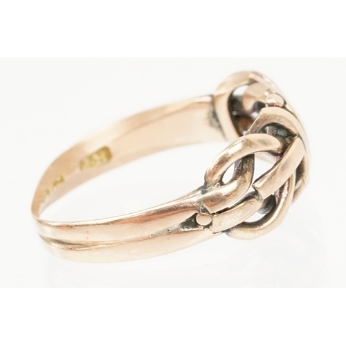 195 - 9ct gold knot design ring with pierced details (hallmarked Chester, partially obscured, size M.5) to... 