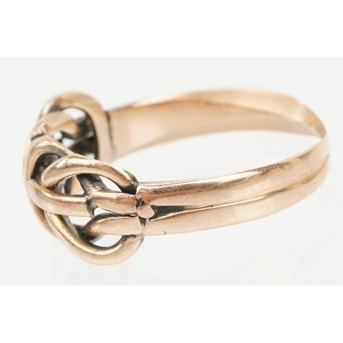 195 - 9ct gold knot design ring with pierced details (hallmarked Chester, partially obscured, size M.5) to... 