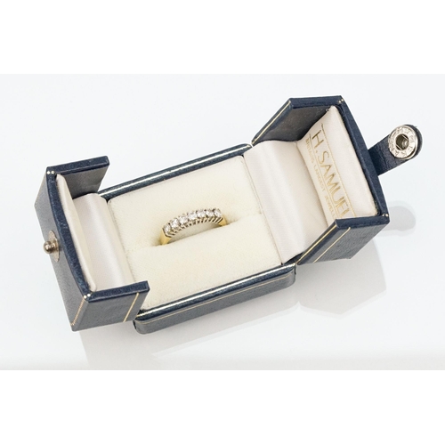 25 - 18ct gold and diamond seven stone ring. The ring being set with seven round brilliant cut diamonds i... 