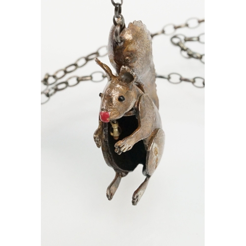 44 - Silver Carol Mather pendant necklace. The necklace having an enamelled squirrel pendant with oval li... 