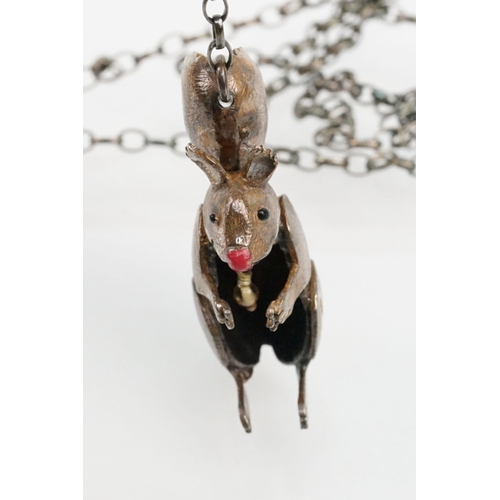 44 - Silver Carol Mather pendant necklace. The necklace having an enamelled squirrel pendant with oval li... 