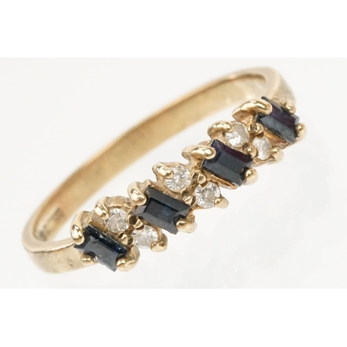 46 - 9ct gold sapphire and diamond ring. The ring being set with four step cut sapphires and six round br... 