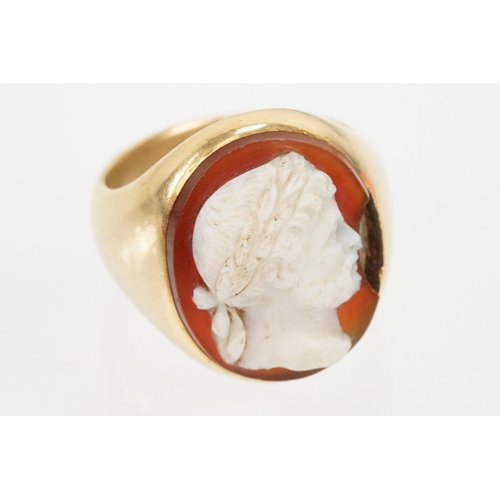 48 - 19th Century gold and carved agate cameo ring. The ring being set with an oval hand carved male came... 