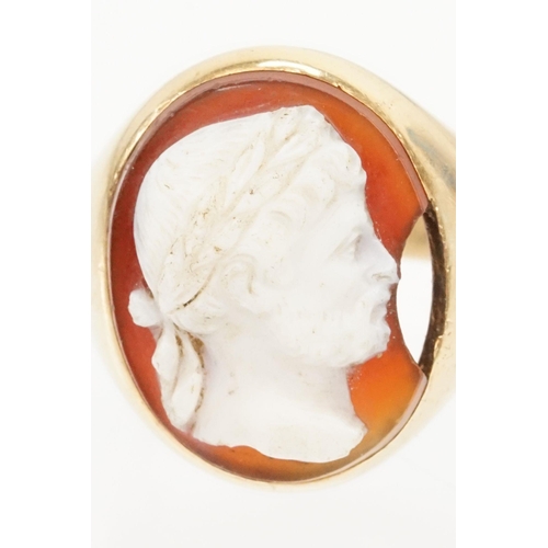 48 - 19th Century gold and carved agate cameo ring. The ring being set with an oval hand carved male came... 