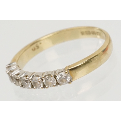 63 - 9ct gold and diamond seven stone ring. The ring being prong set with seven round brilliant cut diamo... 