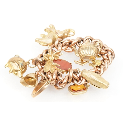 66 - 9ct gold charm bracelet having a rose gold bracelet chain with heart padlock clasp (marked 9ct to cl... 