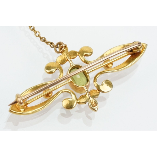 75 - Edwardian 15ct gold, peridot and a seedpearl brooch having an oval cut peridot to the centre with ha... 