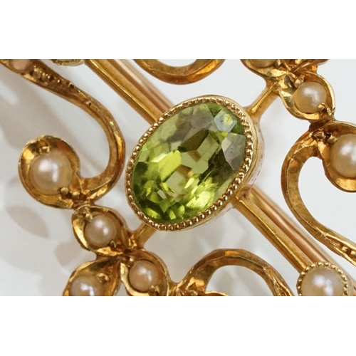 75 - Edwardian 15ct gold, peridot and a seedpearl brooch having an oval cut peridot to the centre with ha... 