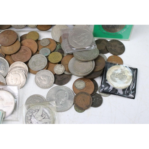 100 - A small collection of British and World coins to include pre decimal silver examples and an American... 