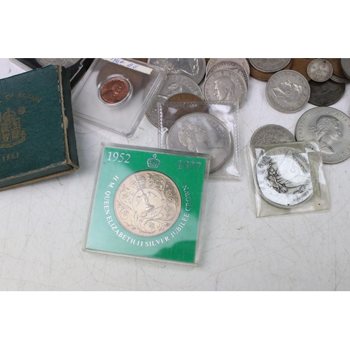 100 - A small collection of British and World coins to include pre decimal silver examples and an American... 