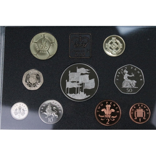 106 - A collection of four Royal Mint annual year sets to include brilliant uncirculated and proof example... 