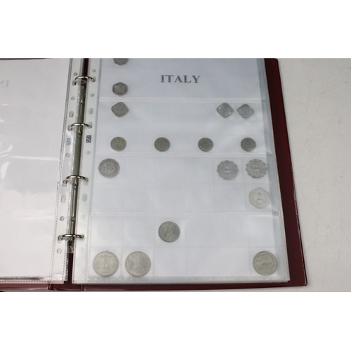 135 - A very large collection of mixed World coins in alphabetical order within six collectors albums.