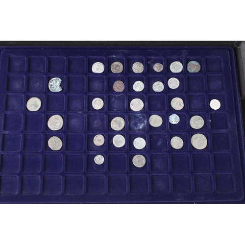 137 - A collection of ancient Roman coins contained within an aluminum collectors case.