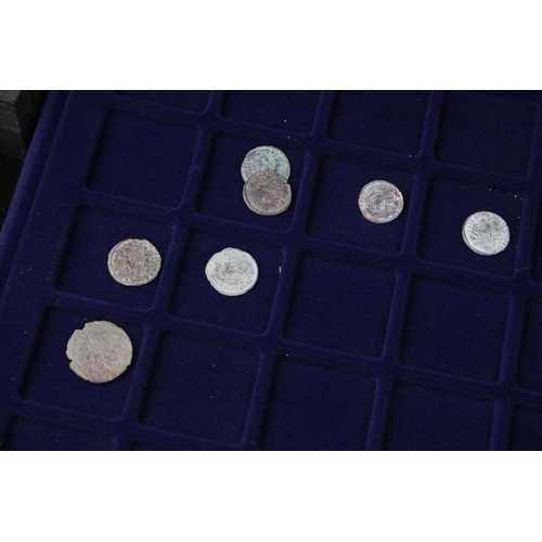 137 - A collection of ancient Roman coins contained within an aluminum collectors case.