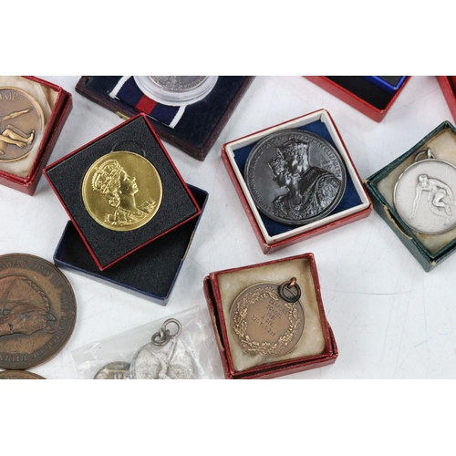 16 - A large collection of Royal and Sporting related medals and medallions to include silver examples.