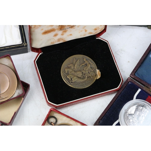 16 - A large collection of Royal and Sporting related medals and medallions to include silver examples.