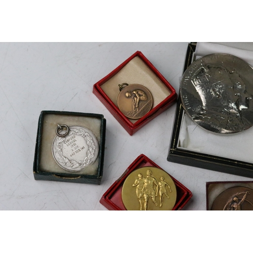 16 - A large collection of Royal and Sporting related medals and medallions to include silver examples.