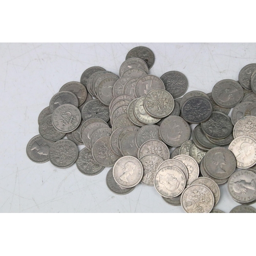 182 - A very large collection of United Kingdom sixpence coins contained within a cashbox.