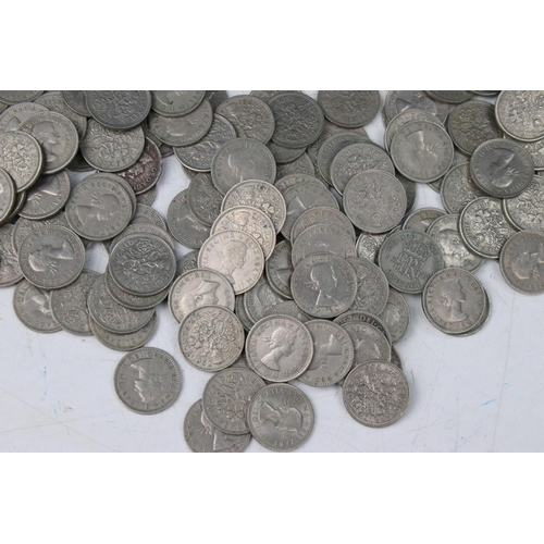 182 - A very large collection of United Kingdom sixpence coins contained within a cashbox.