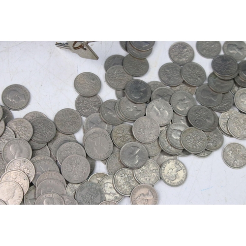 182 - A very large collection of United Kingdom sixpence coins contained within a cashbox.