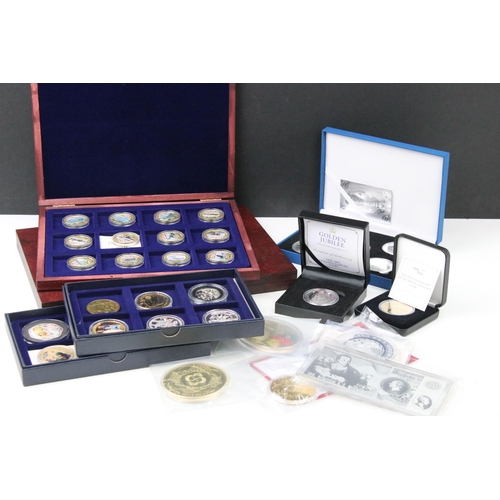 188 - A large collection of proof like collectors coins, mostly silver and gold plated commemorative examp... 