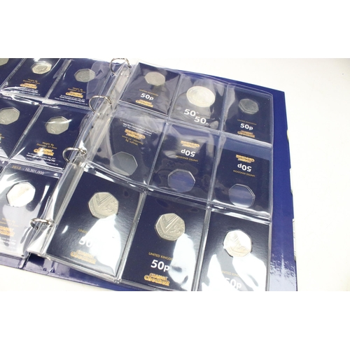 242 - A large collection of Royal Mint United Kingdom 50p collectors coins contained within two change che... 